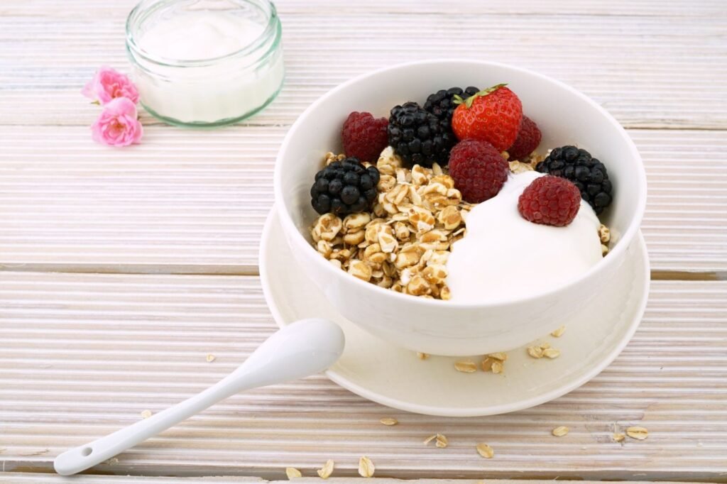 Stirring the Greek yogurt and oat mixture for high protein overnight oats