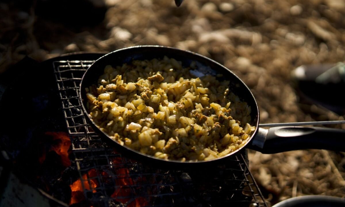 Sweet potato hash with eggs in a skillet, a simple breakfast